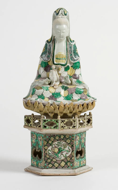 Sculpture of a Bodhisattva Guanyin Seated on a High Pedestal Holding a Baby
